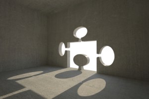 Jigsaw shaped door in dark room